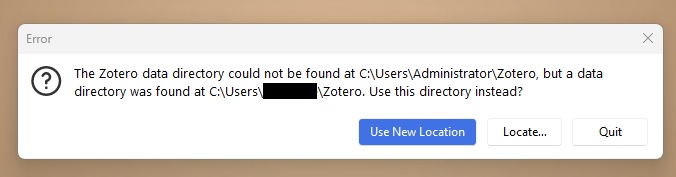An error pop-up that reads "The Zotero data directory could not be found at C:\Users\Administrator\Zotero, but a data directory was found at C:\Users\[redacted]\Zotero. Use this directory instead?" The default option is "Use New Location."